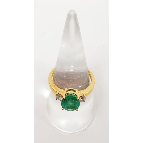 11 - An 18ct emerald and diamond three stone ring, size O/P, gross weight 4.7g. UK shipping £14. We combi... 