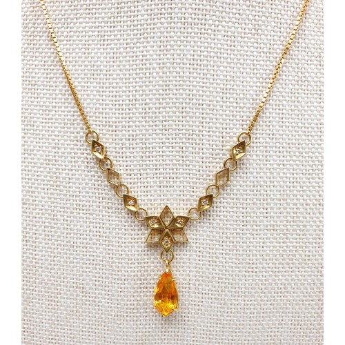 19 - An 18ct gold citrine and diamond set necklace, gross weight 6.8g. UK shipping £14. We combine lots.