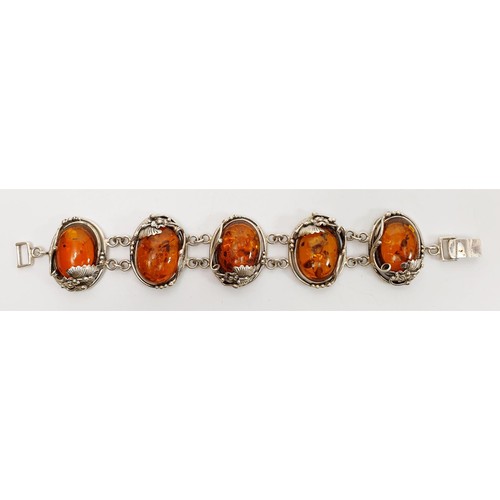 36 - A silver and amber bracelet, length 8