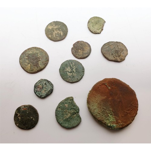 57 - A selection of ancient Roman and other coins. UK shipping £14. We combine lots.