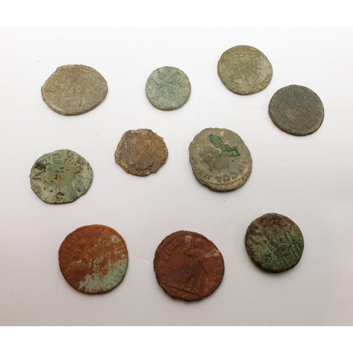 57 - A selection of ancient Roman and other coins. UK shipping £14. We combine lots.