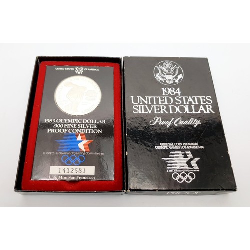 61 - A boxed USA 1984 proof silver dollar. UK shipping £14. We combine lots.