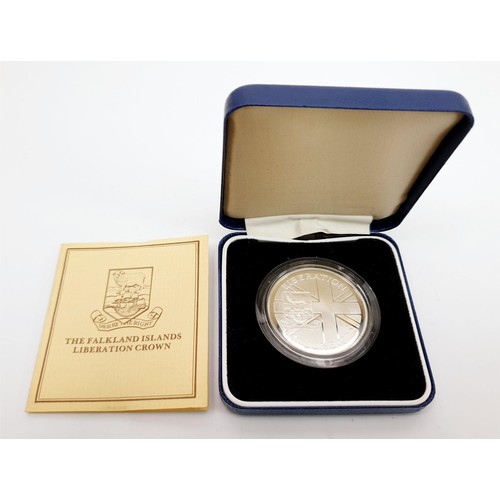 64 - A boxed 1982 The Falkland Islands Liberation silver proof crown. UK shipping £14. We combine lots.