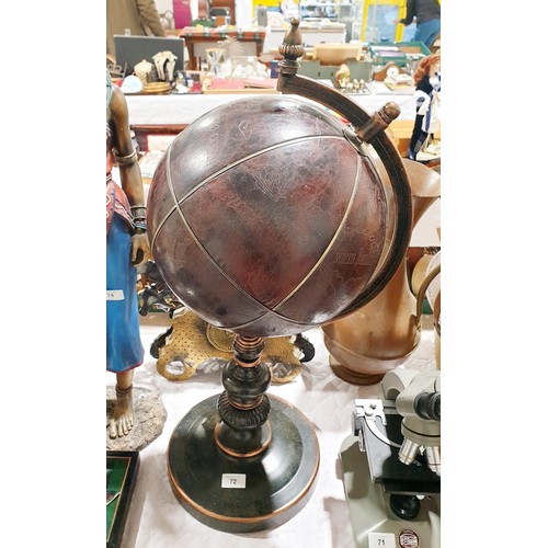 72 - A leather globe, height 28