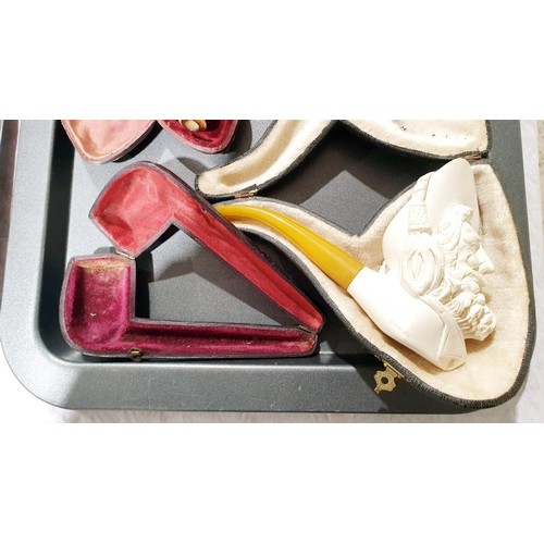 80 - A cased Meerschaum pipe together with three other Meerschaum pipes which are A/F. UK shipping £14.