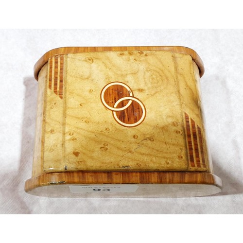 93 - A metal Art Deco cigarette box with faux burr walnut pattern, length 5