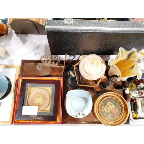 142 - A tray of assorted including a still life painting, an Art Deco sunflower ceramic lidded jar and a c... 