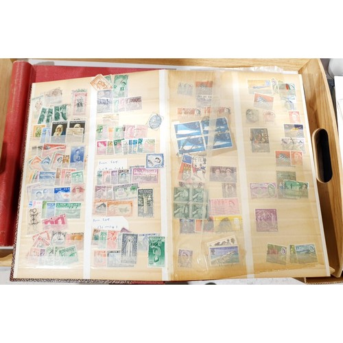 144 - Four stamp albums. UK shipping £14.