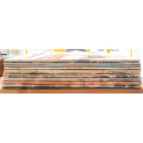 211 - Fifteen vinyl LPs including Paul Simon, Elton John and Jimi Hendrix. UK shipping £14.