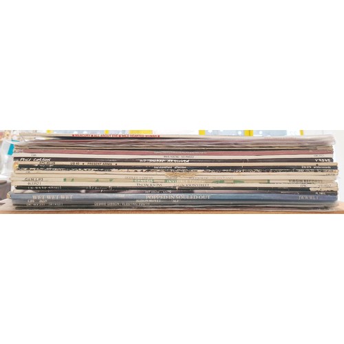 212 - Seventeen vinyl LPs including UB40, Adam Ant and Genesis. UK shipping £14.