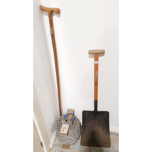 273 - A 200m roll of barbed wire, a shovel and a walking staff. No shipping. Arrange collection or your ow... 