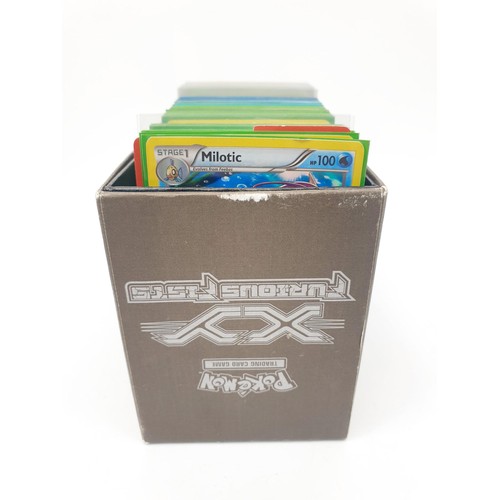 275 - A box of Pokemon cards, mainly Holos and Reverse Holos in top load sleeves. UK shipping £14.