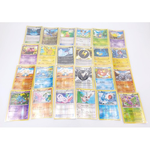 275 - A box of Pokemon cards, mainly Holos and Reverse Holos in top load sleeves. UK shipping £14.