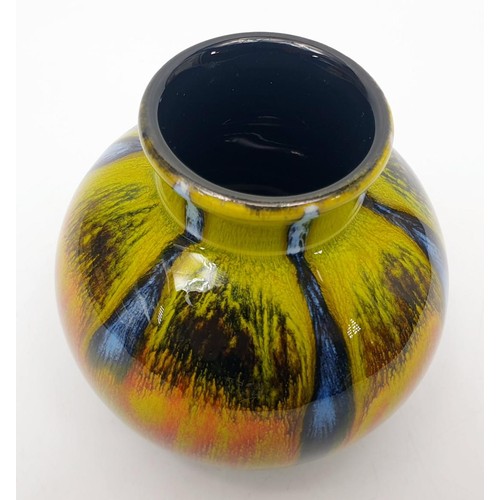 325 - A Poole Pottery vase, height 4