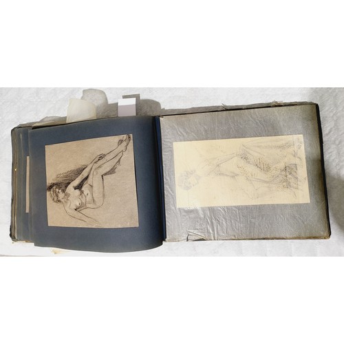 345 - An early 20th century folder containing  pencil studies of female and male nudes, approx. 74. No shi... 