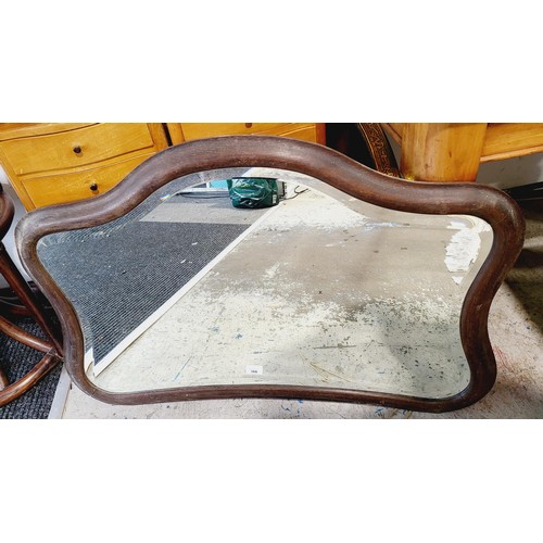 366 - An early 20th century bevelled wall mirror, overall size 39