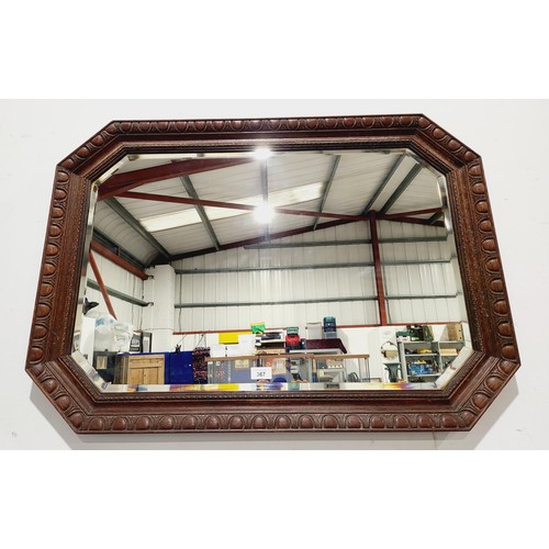 367 - An early 20th century oak framed wall mirror, overall size 35