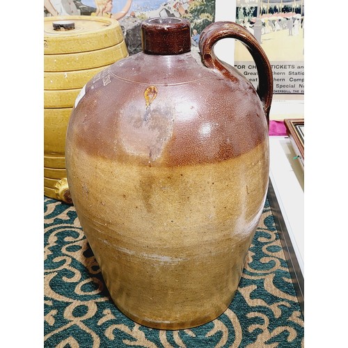 357 - An antique stoneware flagon, height 14.5