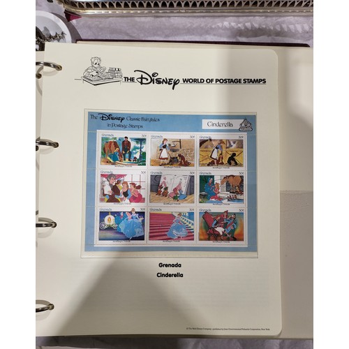 137 - A folder of Disney World of Postage Stamps together with a folder of Royal Mail first day covers. UK... 