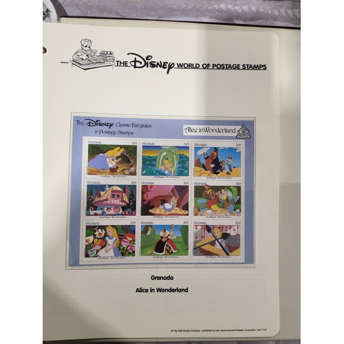 137 - A folder of Disney World of Postage Stamps together with a folder of Royal Mail first day covers. UK... 