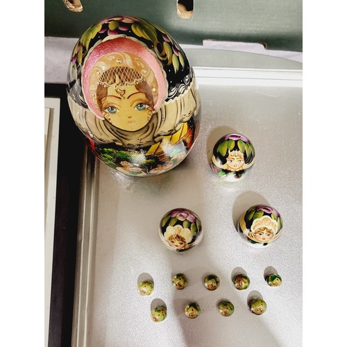 147 - A Russian hand painted nesting doll, the tallest 6.5