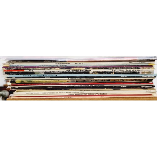 210 - Twenty one vinyl LPs including Chuck Berry and Cliff Richard. UK shipping £14.