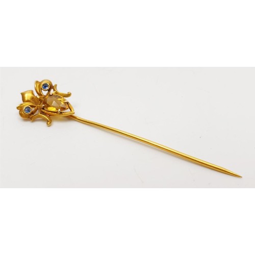 7 - A 14ct gold stick pin set with sapphire and citrine, gross weight 1.8g, length 2.5