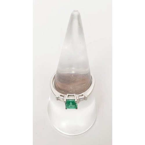 18 - A hallmarked 18ct white gold emerald and diamond ring, gross weight 3.2g, size O. UK shipping £14.