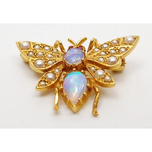 24 - A hallmarked 9ct gold brooch in the form of a bee set with opal, seed pearls and ruby, gross weight ... 