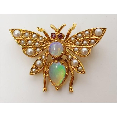 24 - A hallmarked 9ct gold brooch in the form of a bee set with opal, seed pearls and ruby, gross weight ... 