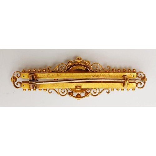 25 - An antique hallmarked 15ct gold bar brooch set with a diamond, gross weight 3.9g, length 2