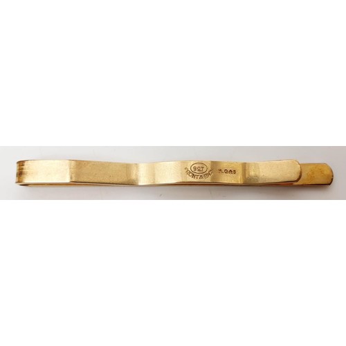 28 - A 9ct gold tie clip, length 2.75