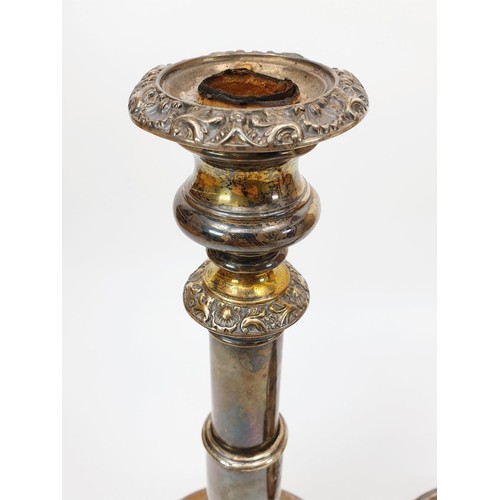 37 - A pair of hallmarked silver weighted George IV candlesticks, by John & Thomas Settle, Gunn & Co., he... 