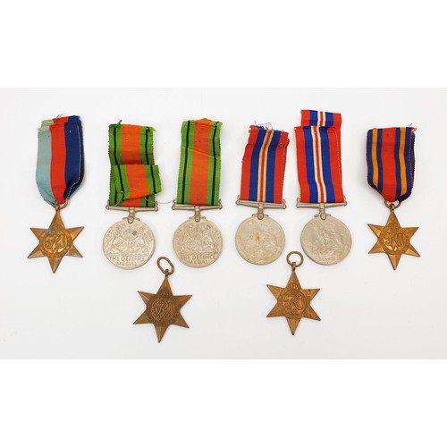 40 - World War II medals: two 1939-45, two defence medals, two 1939-45 stars, Burma star, and Atlantic st... 