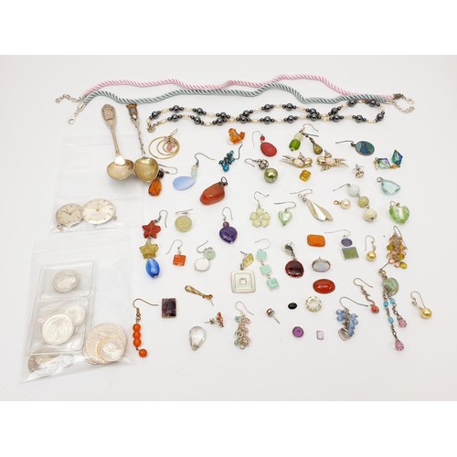 45 - A selection of earrings including silver and assorted. UK shipping £14.