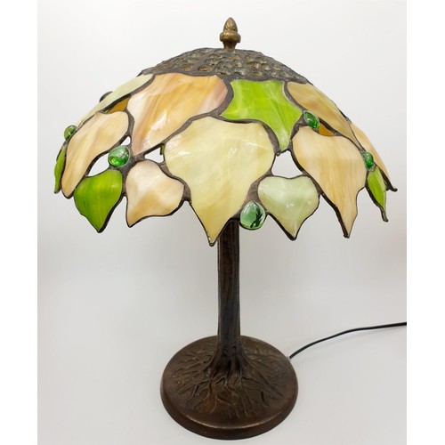 81 - A vintage quality Tiffany style lamp with cast metal base, height 16.5