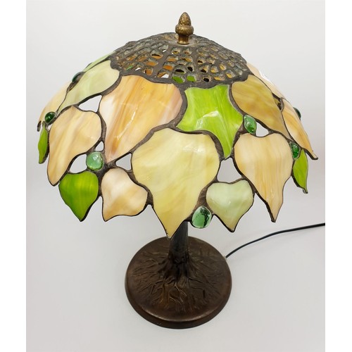 81 - A vintage quality Tiffany style lamp with cast metal base, height 16.5