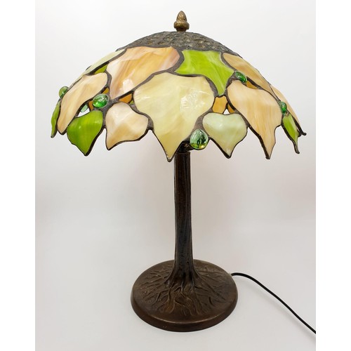 81 - A vintage quality Tiffany style lamp with cast metal base, height 16.5