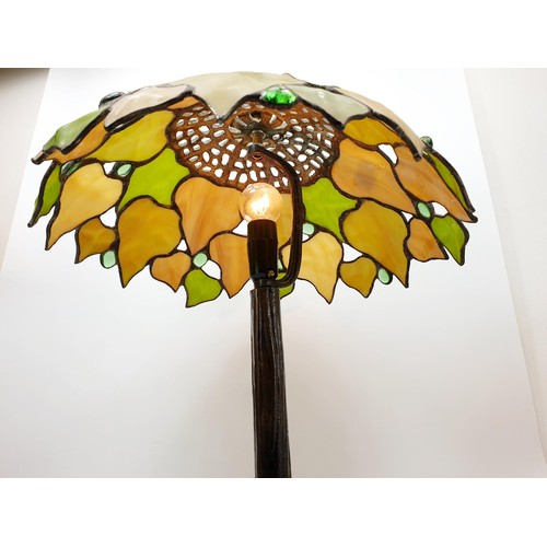 81 - A vintage quality Tiffany style lamp with cast metal base, height 16.5