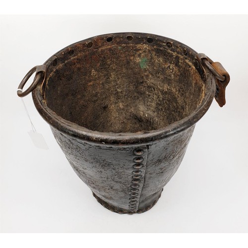 82 - An antique leather bucket, height 11.25