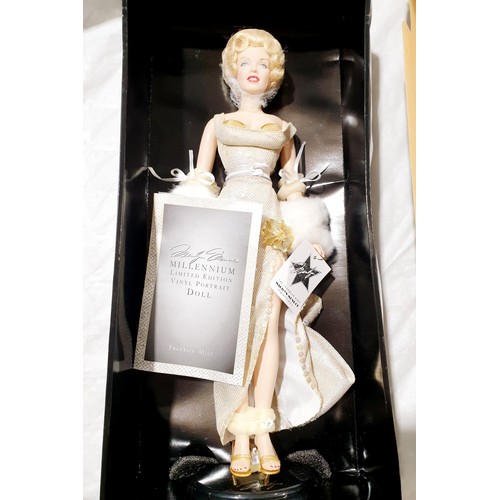 106 - A boxed Franklin Mint Marilyn Monroe Millennium limited edition vinyl doll portrait, height 16