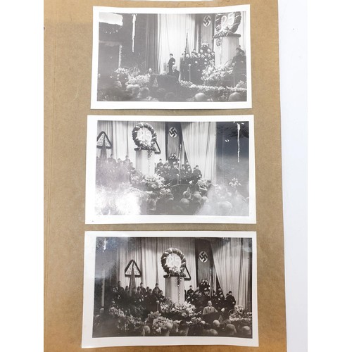 159 - Two photographs depicting a room decorated for a Nazi Third Reich 