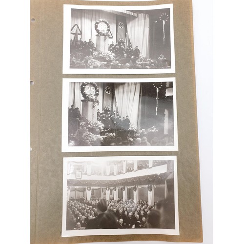 159 - Two photographs depicting a room decorated for a Nazi Third Reich 