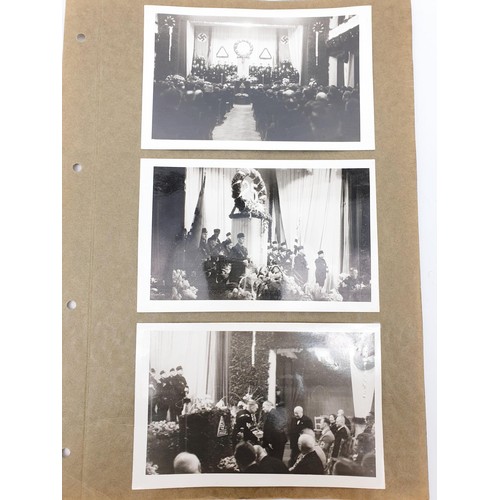 159 - Two photographs depicting a room decorated for a Nazi Third Reich 