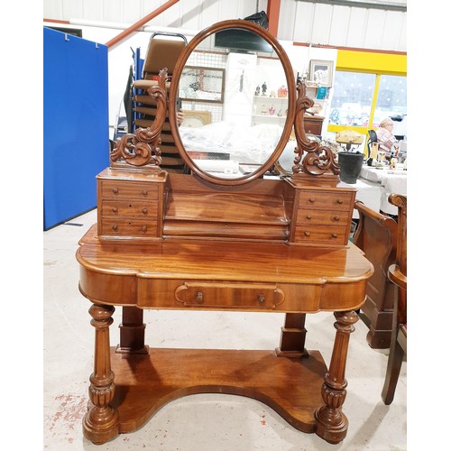 181 - A Victorian mahogany duchess style dressing table on column supports, one central drawer, six small ... 