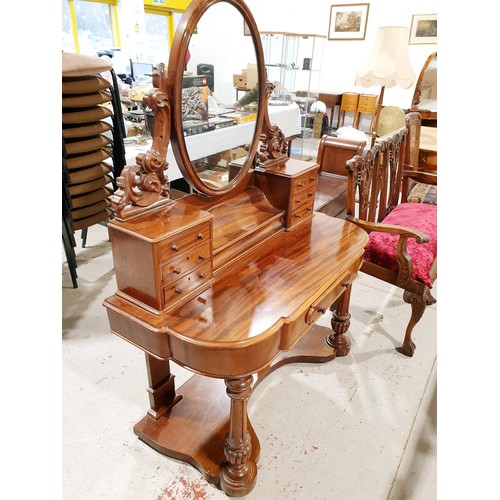 181 - A Victorian mahogany duchess style dressing table on column supports, one central drawer, six small ... 