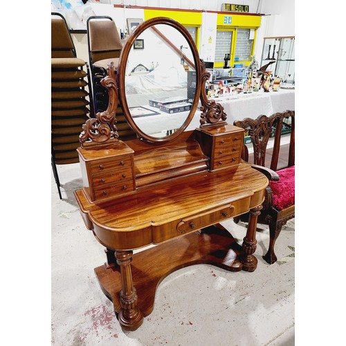 181 - A Victorian mahogany duchess style dressing table on column supports, one central drawer, six small ... 