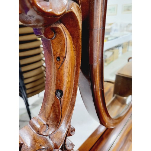 181 - A Victorian mahogany duchess style dressing table on column supports, one central drawer, six small ... 