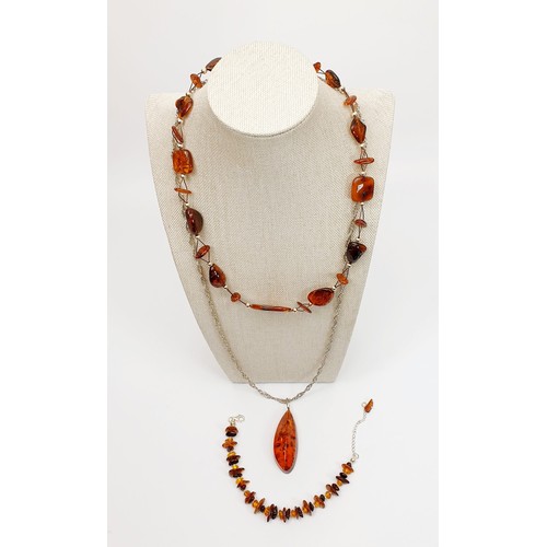 2 - A silver and amber necklace and bracelet, necklace length 19