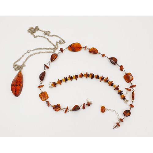 2 - A silver and amber necklace and bracelet, necklace length 19